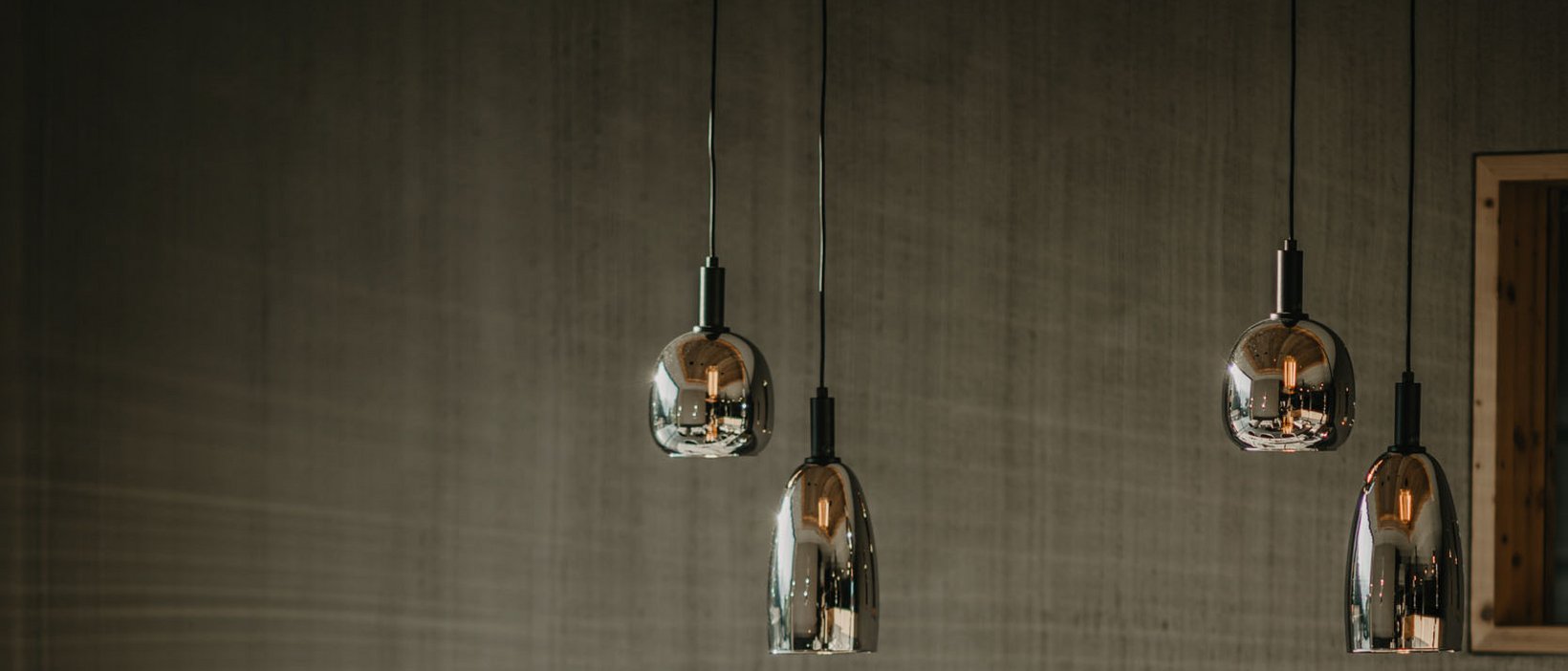 Welcome to Hotel Christoph in Olang, Plan de Corones/Kronplatz Modern dining area with table set and hanging pendant lights